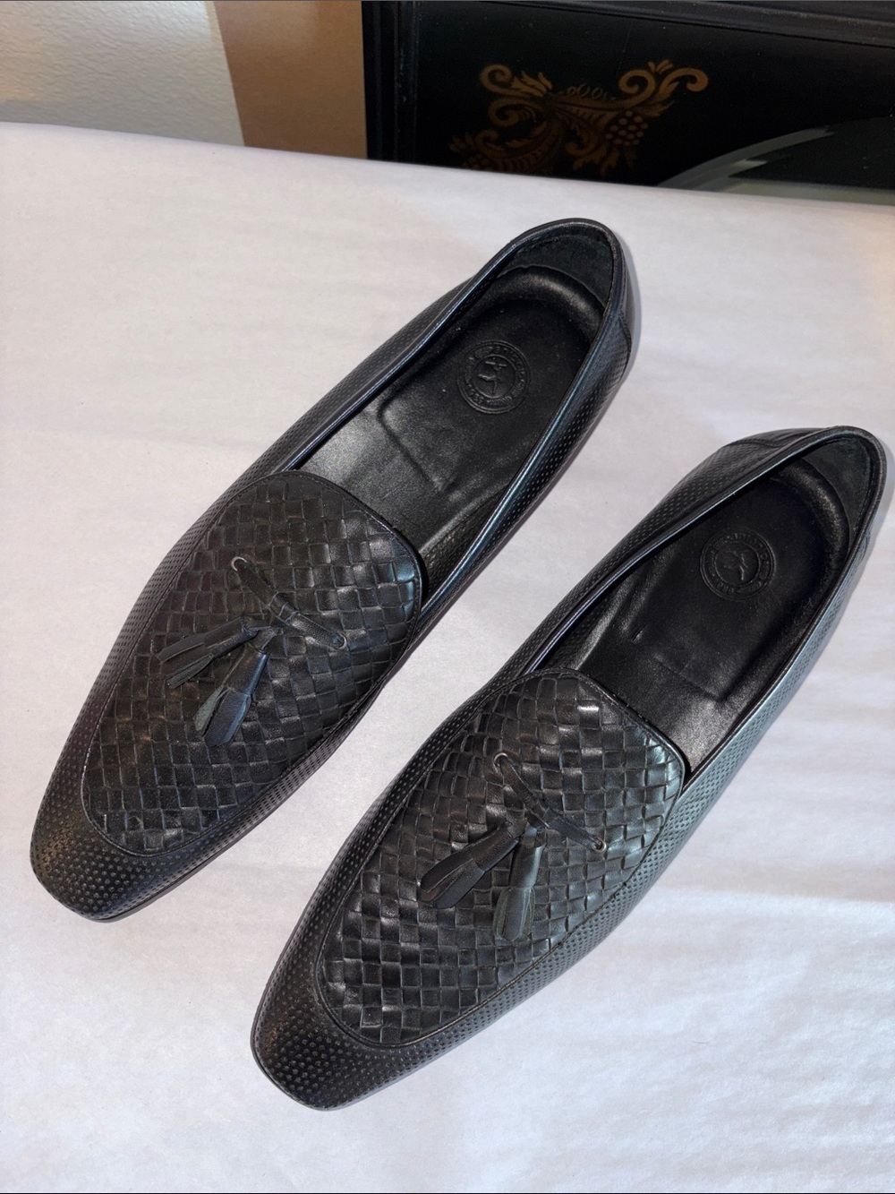 Black intrecciato, tassel, and dotted leather loafers- WELL MADE